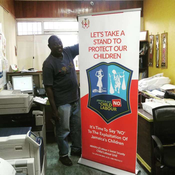 Retractable pull-up banner design, print and assembled for the Ministry of Labour Jamaica