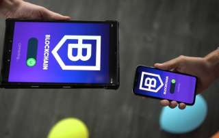 a person holding a cell phone in their hand